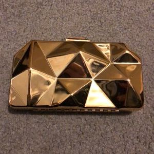 Gold clutch